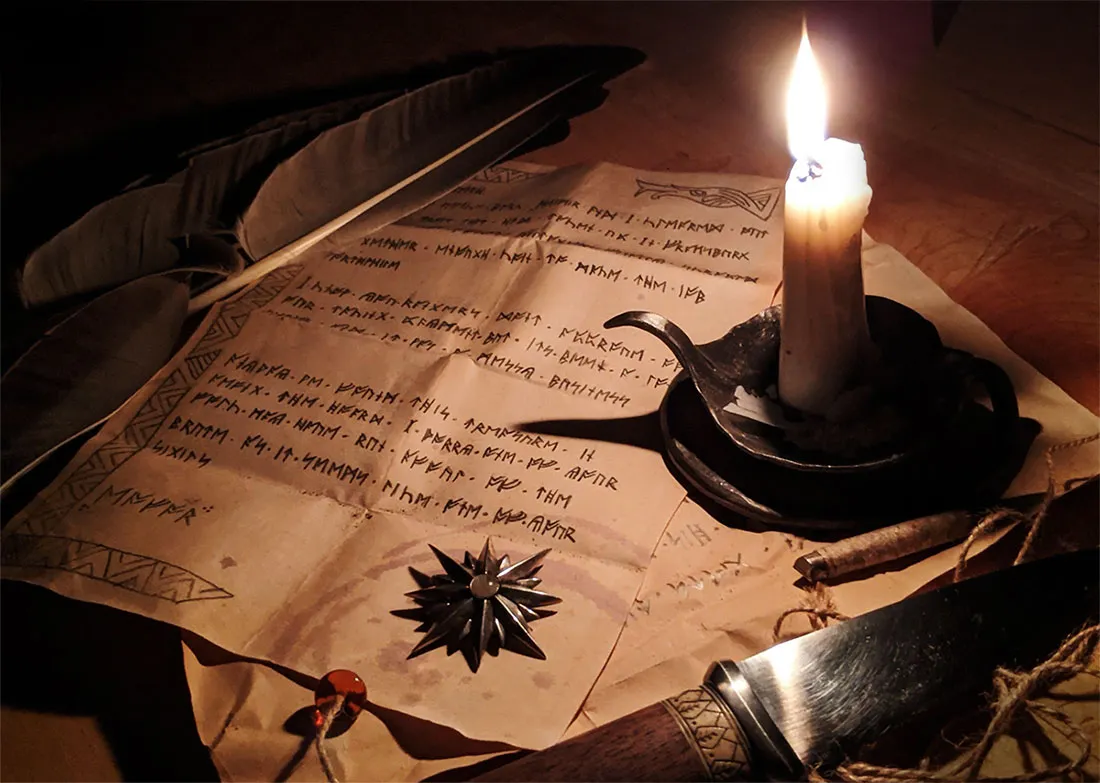 A letter written in cirth runes, sealed with wax, by candlelight